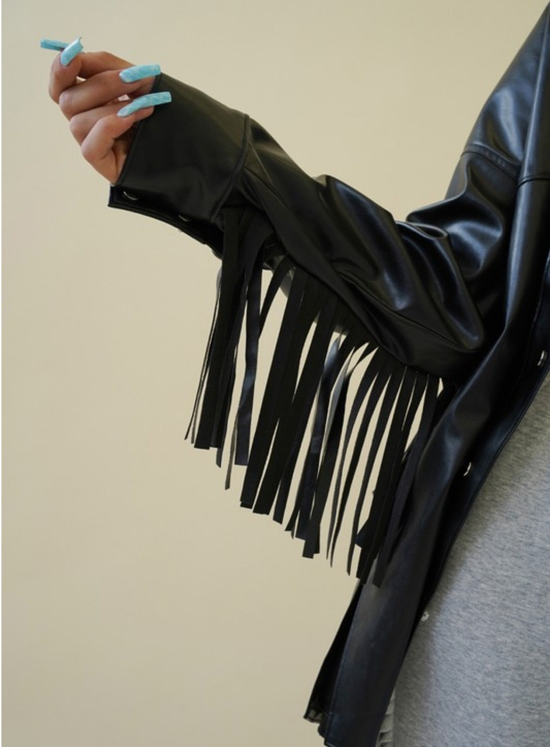 Oversized Stretchy Vegan Leather Shirt with Fringe Detailing and Metal Buttons – The Ultimate Edgy-Chic Statement Piece